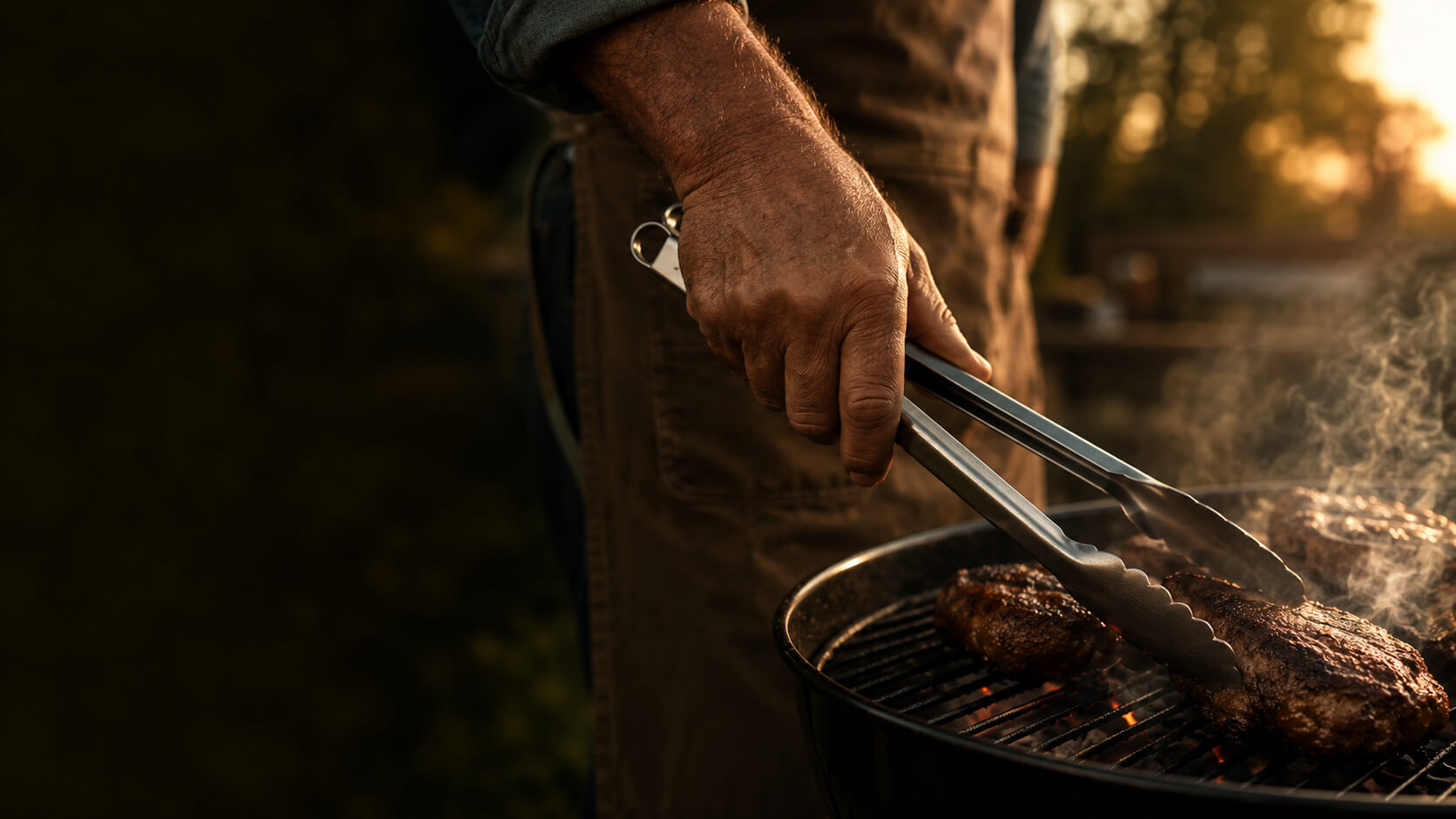 Amerivale outdoor tools collection flat-lay featuring grilling accessories, kitchen gadgets, and fish prep tools arranged on a workspace surface