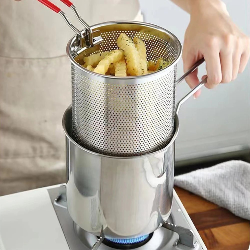 Fry King deep fryer filtering used cooking oil through built-in mesh strainer for reuse